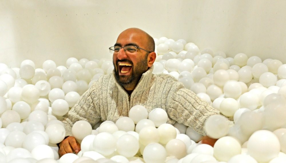 Co-founder Shamash Alidina playing in white ball pit