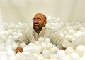 Co-founder Shamash Alidina playing in white ball pit