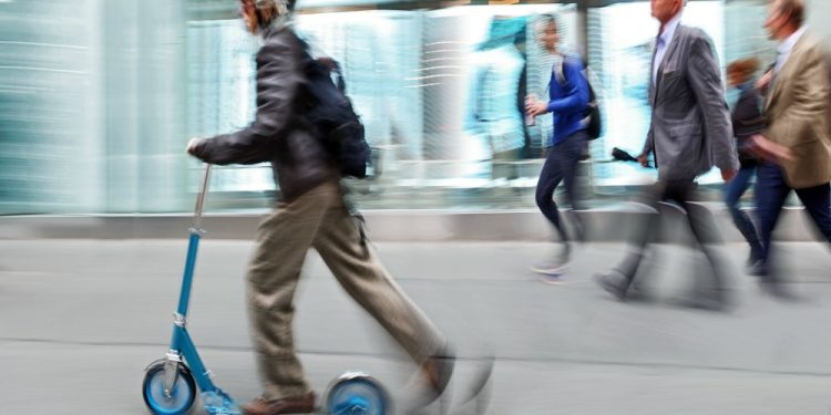 man on scooter
